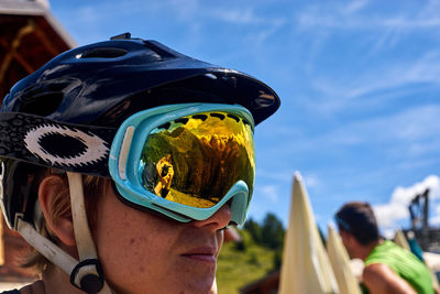 Portrait of man wearing sunglasses against sky