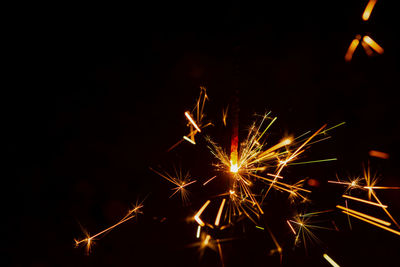 Firework display at night