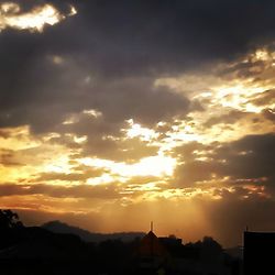 Scenic view of mountains at sunset