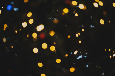 Defocused image of illuminated christmas tree