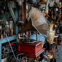 Close-up of electric lamps hanging at market