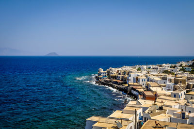 Cityscape with sea in background