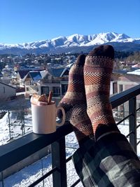 Cosy wintertime picture with wool socks and hot chocolate from ski resort bakuriani, georgia