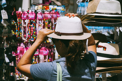 Woman standing at market stall