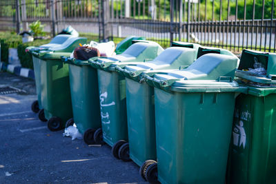 Garbage bin on street in city