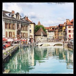 View of canal in city