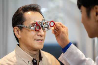 Close-up of young man wearing sunglasses