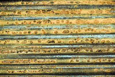 Full frame shot of rusty metallic wall