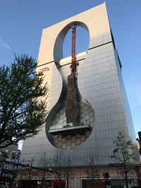 Low angle view of modern building against sky
