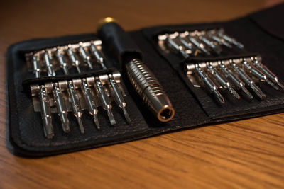 High angle view of guitar on table
