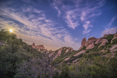 Scenic view of mountain against sky during sunset