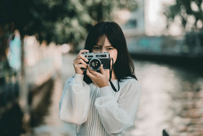 Portrait of man photographing