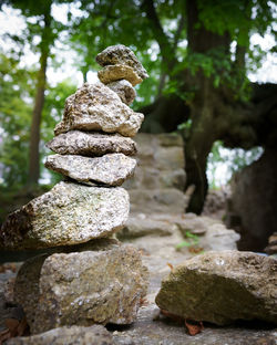 Close-up of stone stack on rock