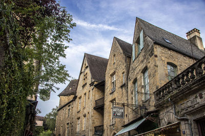 Low angle view of old building against sky