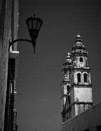 Low angle view of clock tower against sky