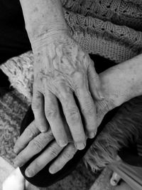 High angle view of hands