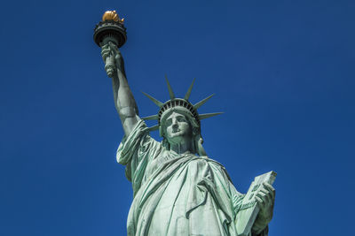 Low angle view of statue against clear sky