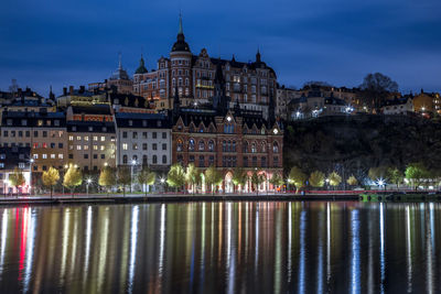 Illuminated buildings in city at night