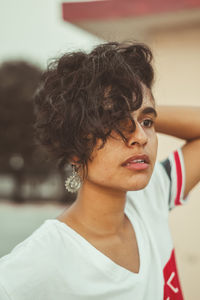 Close-up portrait of a serious young woman