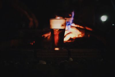 Close-up of illuminated tea light candles