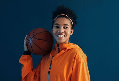 Young man playing basketball