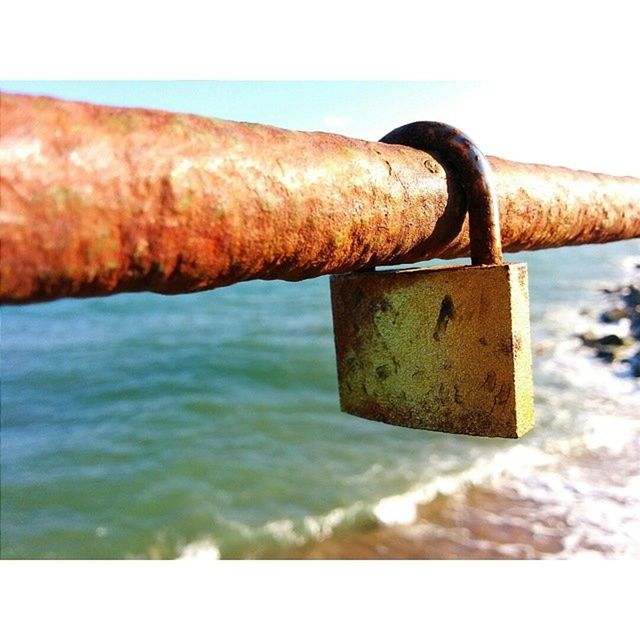 rusty, metal, close-up, part of, water, old, metallic, focus on foreground, cropped, sea, day, clear sky, outdoors, deterioration, sky, obsolete, chain, weathered, no people, run-down