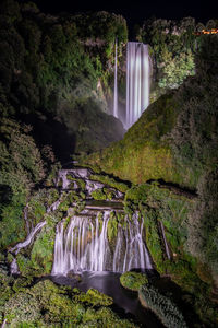 View of waterfall in forest