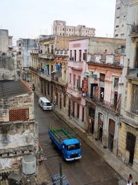 High angle view of street amidst buildings in city