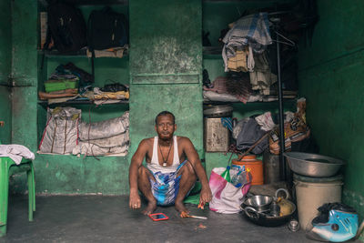 Portrait of a young man sitting outdoors