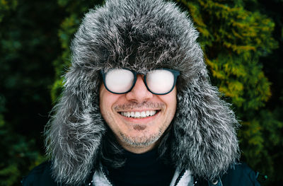 Man with foggy glasses in cold winter day. eyeglasses concept