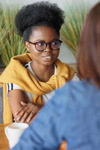 Portrait of young woman wearing sunglasses