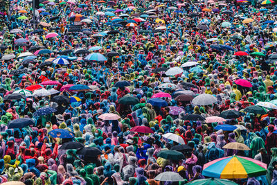 High angle view of group of people in rain