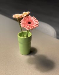 Close-up of flower vase on table