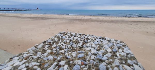 Scenic view of beach against sky