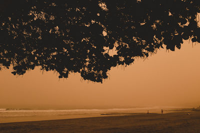 Scenic view of sea against sky at sunset