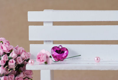 Close-up of pink flower on table