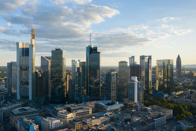 Aerial drone view over frankfurt am main, germany skyline in beautfiful afternoon sunlight and cloudscape in june 2020