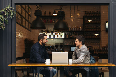 Business people having drink in cafe