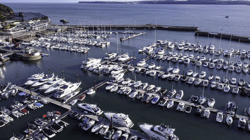 High angle view of boats moored in harbor