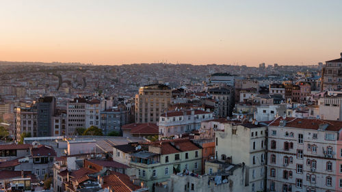 High angle view of townscape against sky at sunset