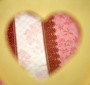 Close-up of red object on table