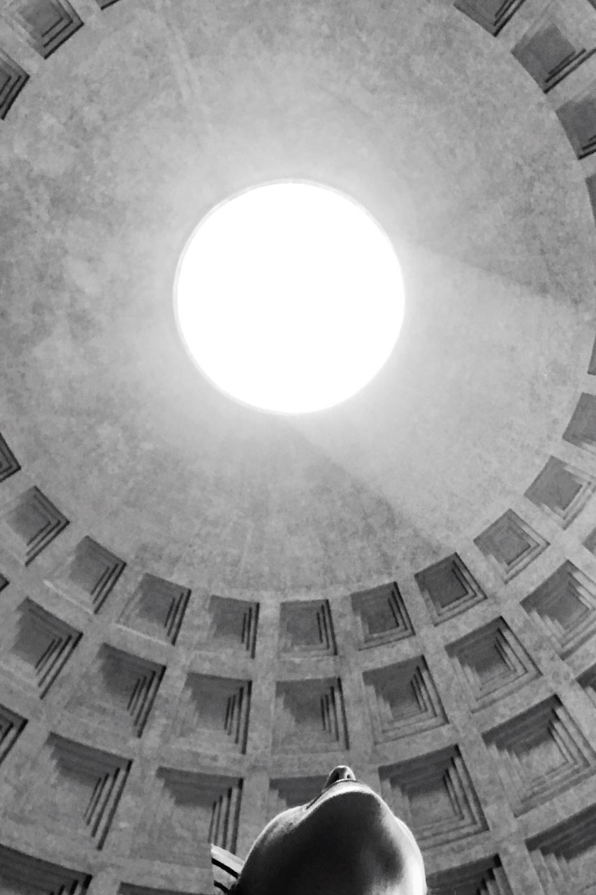 LOW ANGLE VIEW OF PERSON IN CEILING