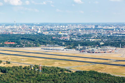 High angle view of buildings in city against sky