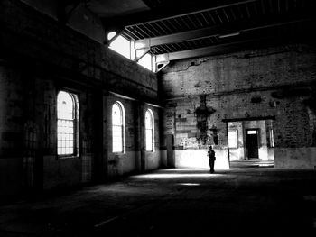 Woman standing in building