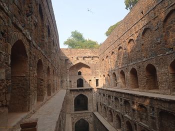 Low angle view of old building against sky