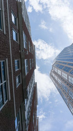 Low angle view of skyscrapers against sky