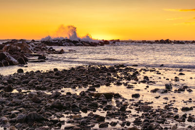 Scenic view of sea against sky during sunset