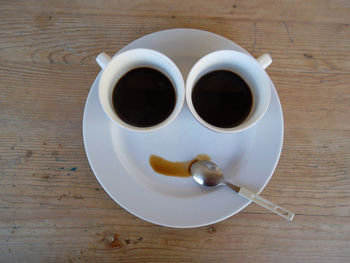 Directly above shot of coffee cup on table