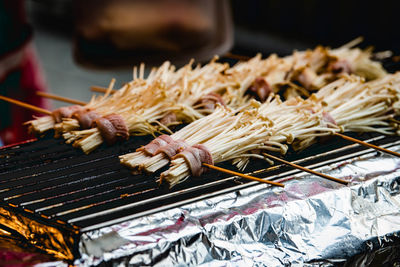 Close-up of meat on barbecue grill