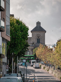 Low angle view of city street against sky